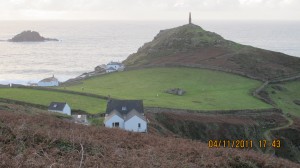 Cape Cornwall with remains of St Helens chapel in midground
