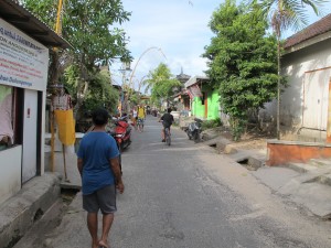 Main street in local village Jungut Batu